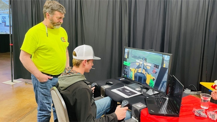 Cash Haun driving the wheel-loader simulator 