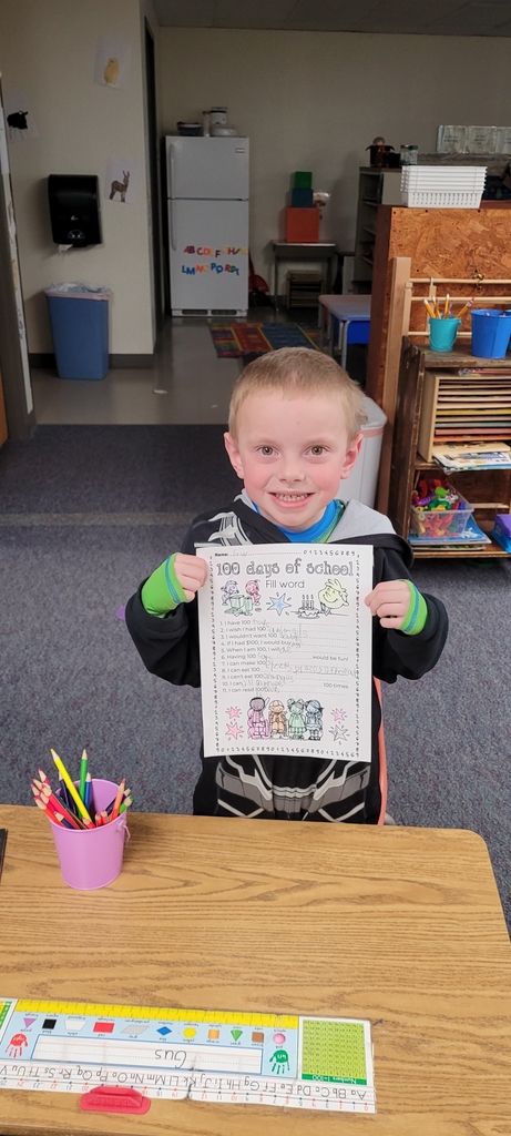 Gus completed his 100th day worksheet.