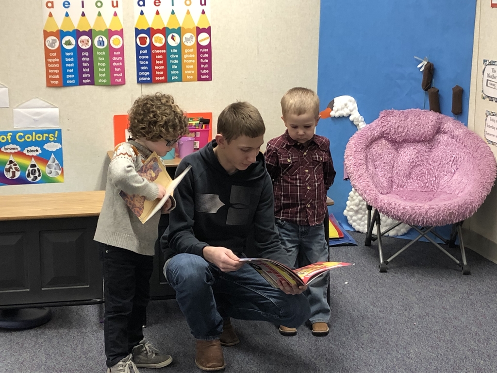 Reading to the preschool students 
